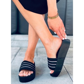 Leah Black high-soled flip-flops 1