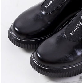 Black brogues on the Siddons platform 1