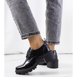 Black high-heeled shoes from Vance 1