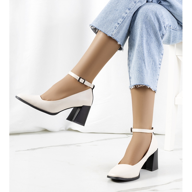 Beige pumps with a strap 1