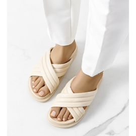 Beige slippers on the Daintree platform 2