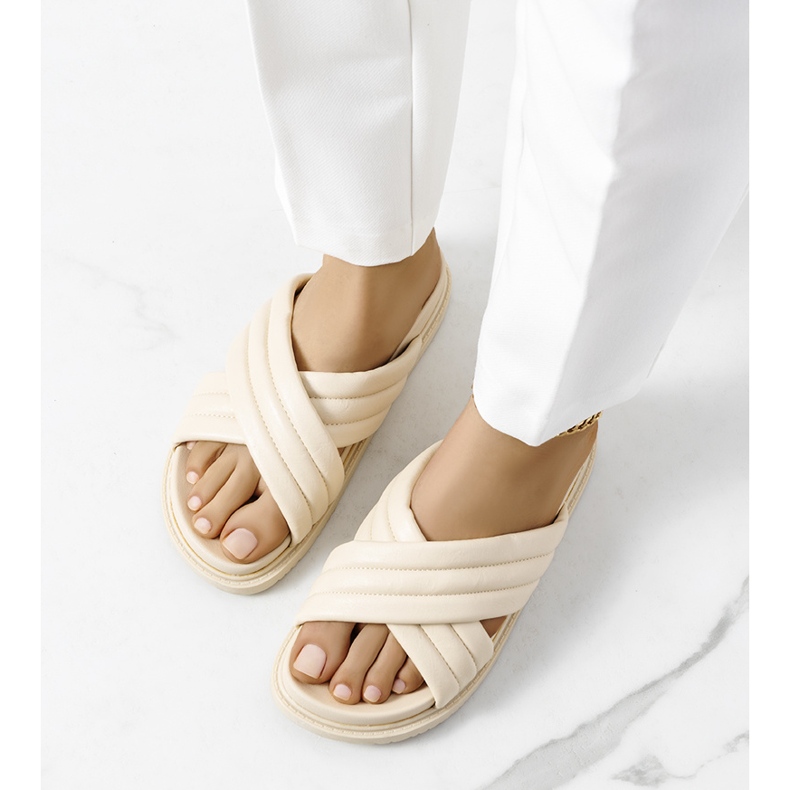 Beige slippers on the Daintree platform 2