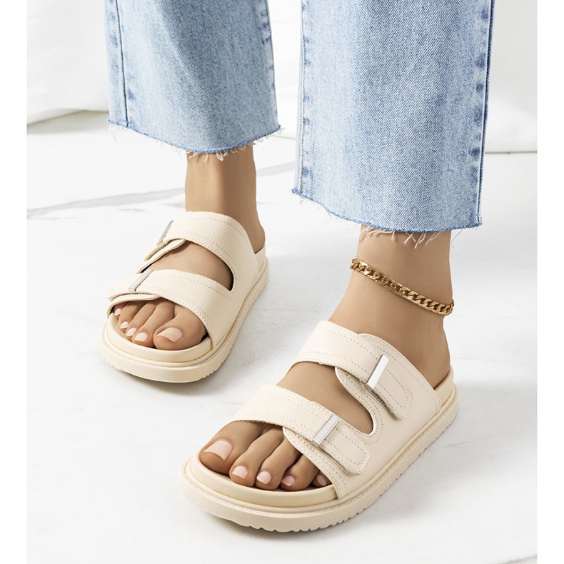 Beige slippers on the Boonah platform 1