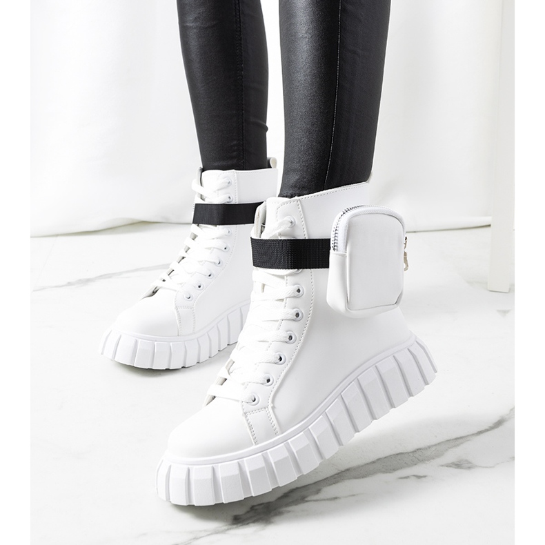 White sneakers on the Haver platform 1