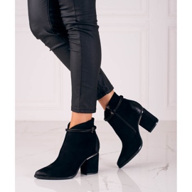 Black suede boots on the W. Potocki post 1