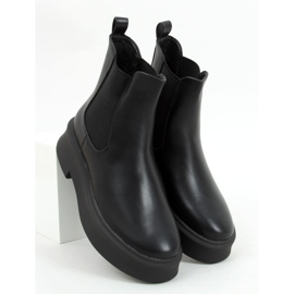 Chelsea boots on a thick Laos Black sole 1