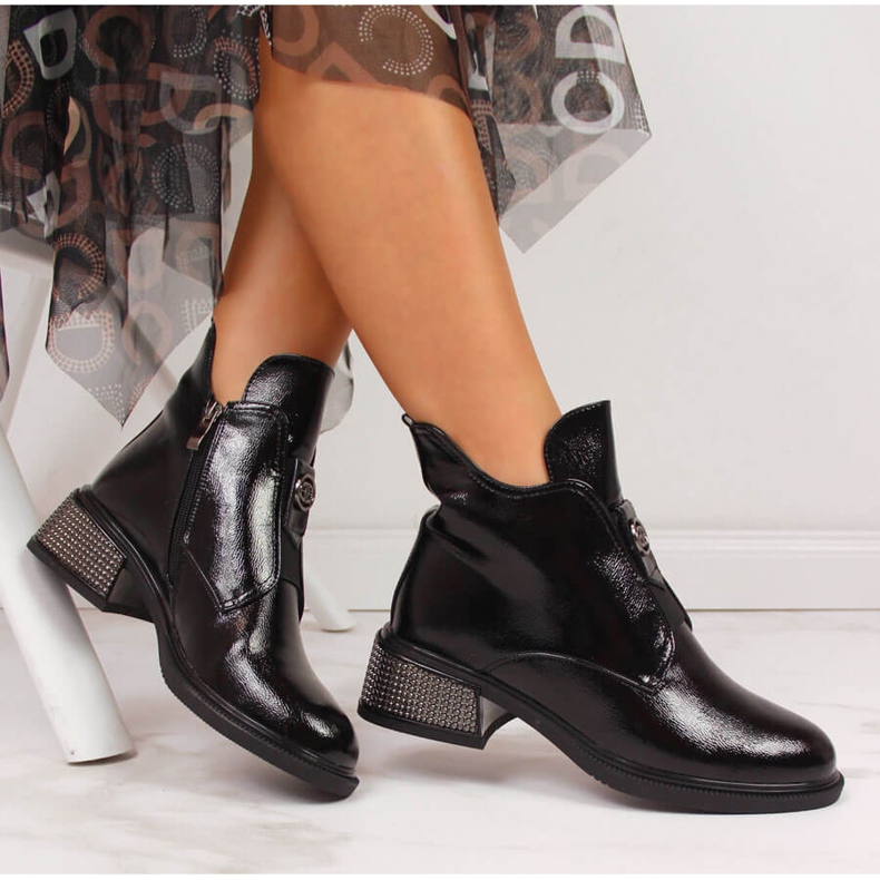 Black Filippo women's boots on a decorative block 1