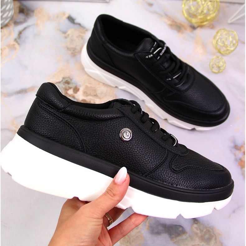 Women's sports shoes on the black Vinceza platform 1