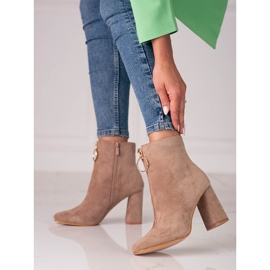 Ladies' beige boots on the Shelovet post with a golden zipper 1
