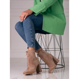 Ladies' beige boots on the Shelovet post with a golden zipper 2