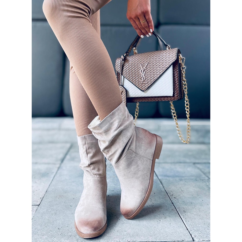 Boots on a hidden Bansi Beige wedge 1