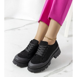 Black sneakers on the Dearth platform 1