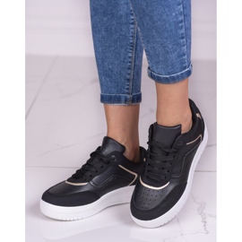 Black Shelovet women's sports shoes on a white platform 1