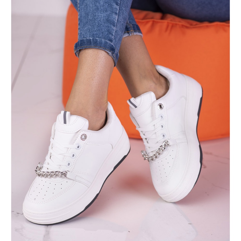 Women's white sneakers on a platform with a Shelovet chain 1
