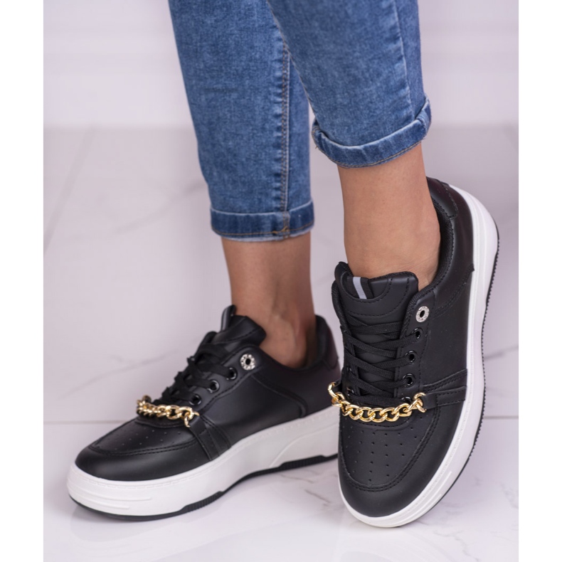 Women's black sneakers on a platform with a Shelovet chain 1