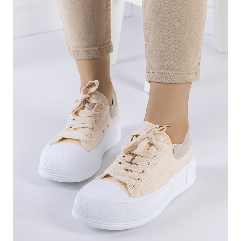 Beige sneakers on the Kilkenny platform 1