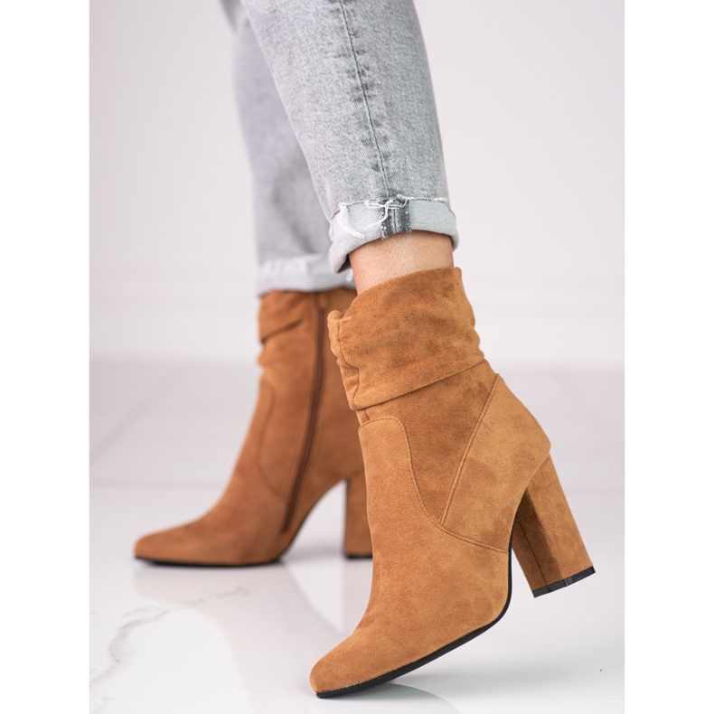 Brown women's boots on the Shelovet post with a ruffled upper 1