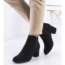 Black ankle boots on the Runswick post 1
