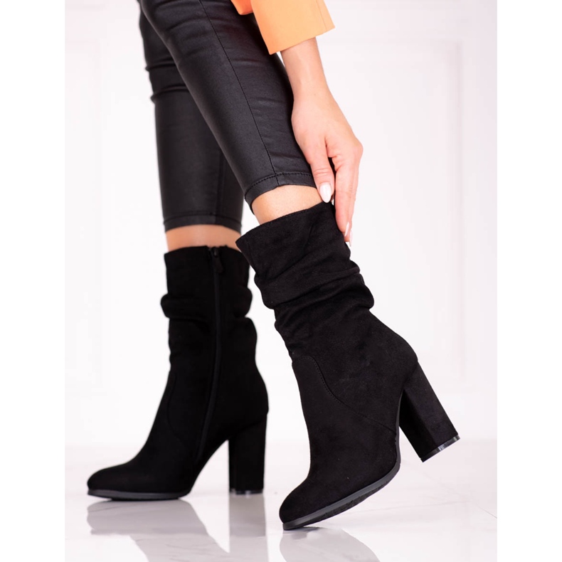 Women's boots on a high Shelovet post with a ruffled upper black 1 Women's boots on a high Shelovet post with a ruffled upper black 1