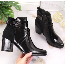 Black Laura La.Fi insulated boots with fur on a post 1