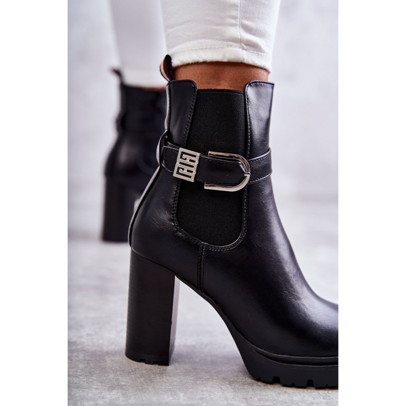 FE1 Black Maresol leather boots on a post with a decorative belt 2