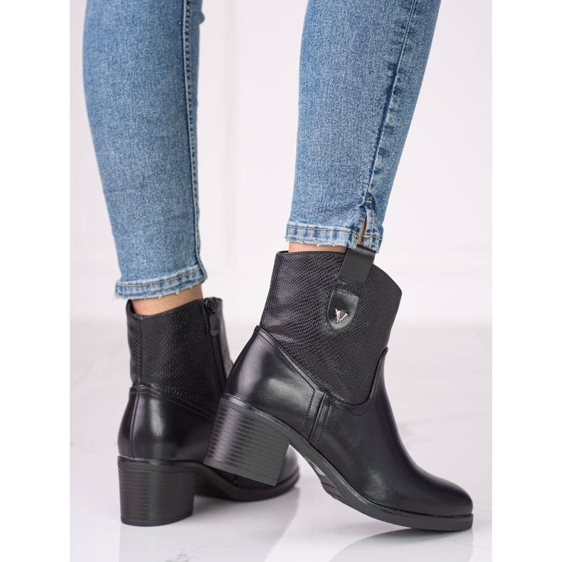Women's black boots on a low S. Barski post 1
