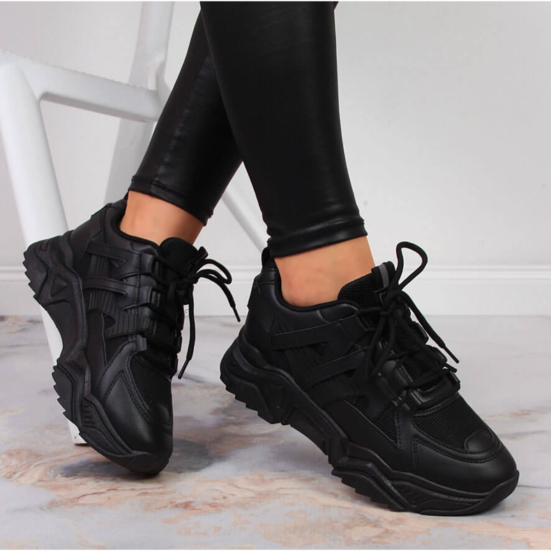 Women's sports shoes on a thick black sole NEWS 1