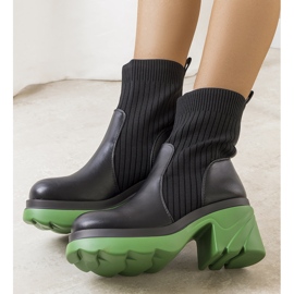 Black boots with a red Tomlin sole 1