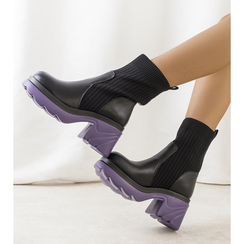 Black boots with a purple Tomlin sole 1