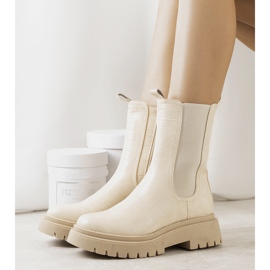 Beige boots on the Timaru platform 1