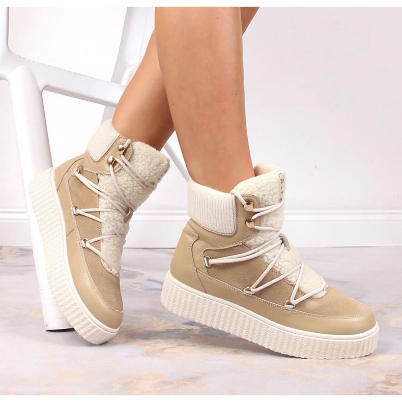 Leather lace-up boots on a beige Laura La.Fi platform 1