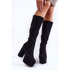 PA1 Suede boots on massive heels and a black Nevira platform 1
