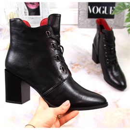 Black insulated women's boots on the post by M. Daszyński 1