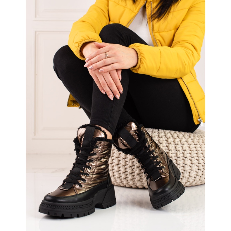 Women's snow boots on the shelovet platform black golden 1