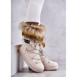 Women's beige laced snow boots 6