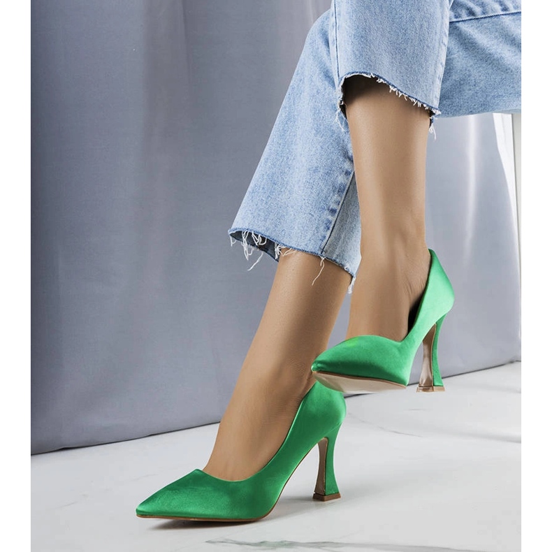 Green pumps with an hourglass heel from Otto 2