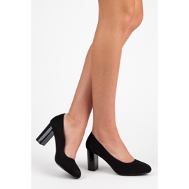 Seastar Pumps With A Varnished Pole black 1