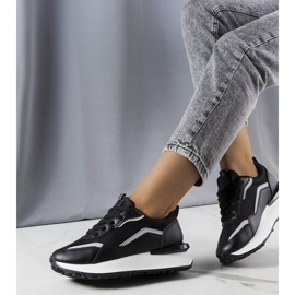 Black sneakers on the Ada platform 1