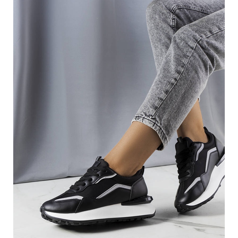 Black sneakers on the Ada platform 1