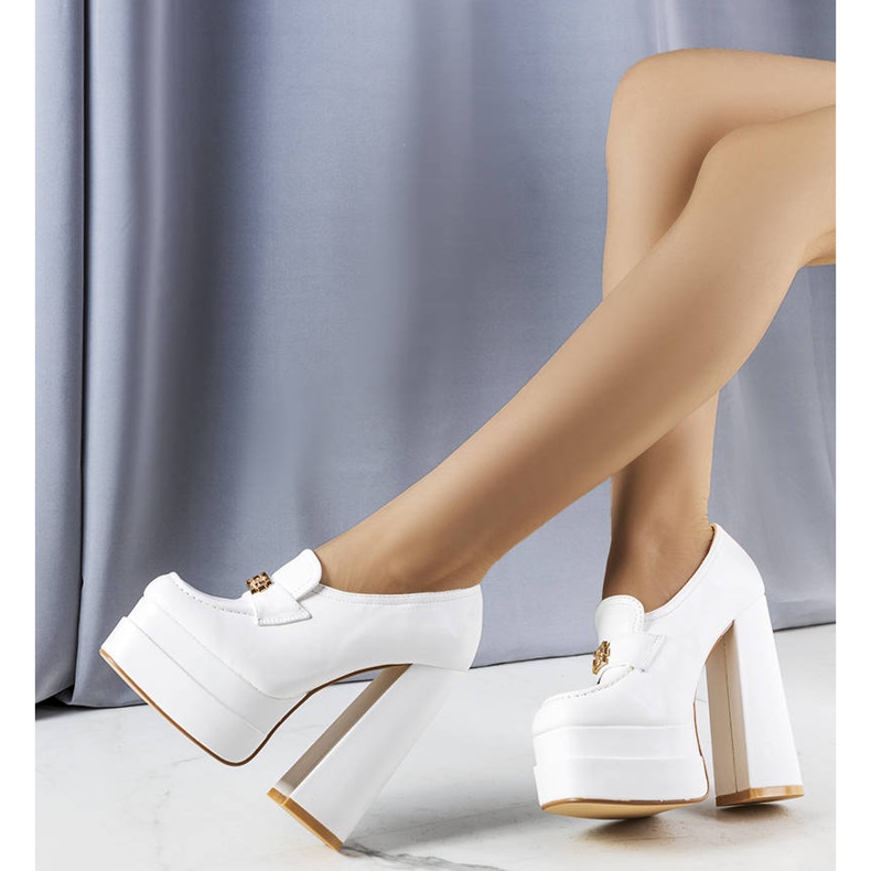 White pumps on a chunky block from Janie 1