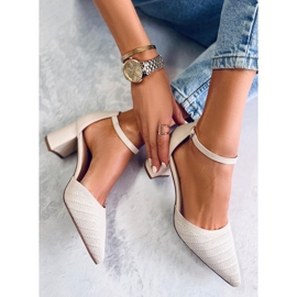 BM Rossi Beige heeled pumps with a belt 1