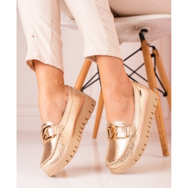 Golden women's moccasins on the Shelovet platform 1