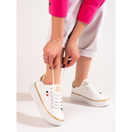 W. Potocki White sports shoes on the Potocki platform 1