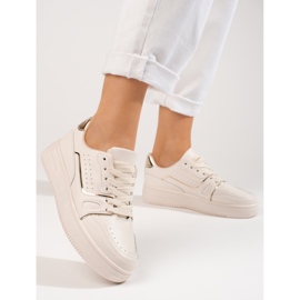 Women's beige sneakers on the Shelovet platform 1