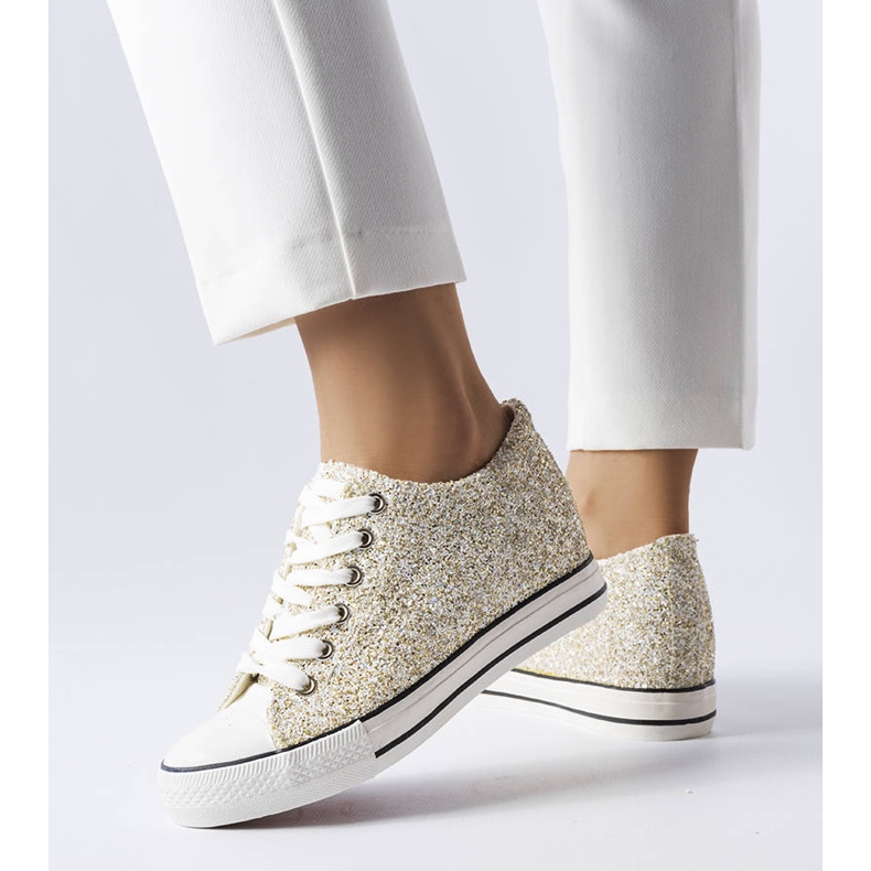 Gold sneakers with a low wedge from Garceau golden 1