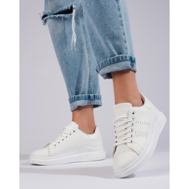 White sports shoes sneakers on the Shelovet platform 1