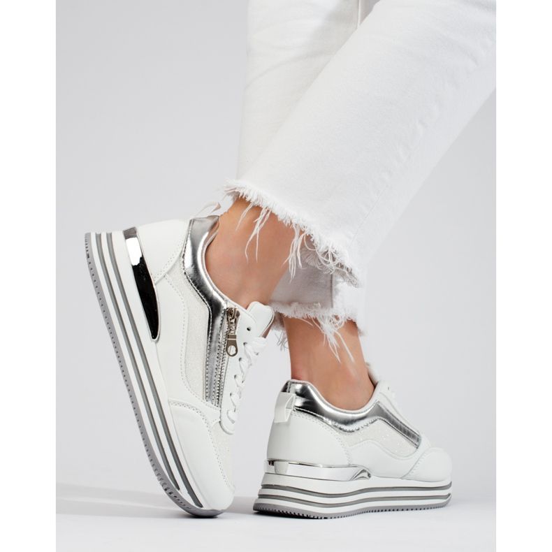 White and silver sneakers on the Shelovet platform 1