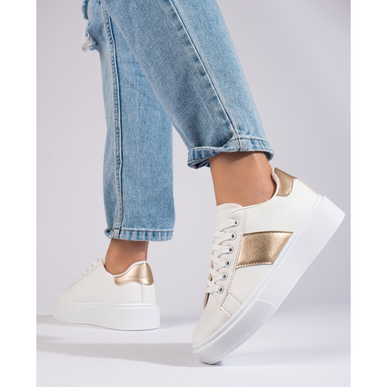 White women's sneakers on the Shelovet platform 2