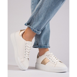 White women's sneakers on the Shelovet platform 1