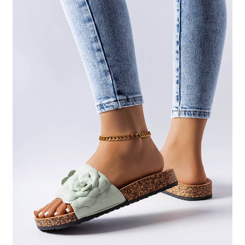 Green sandals decorated with a Desaulniers flower 1